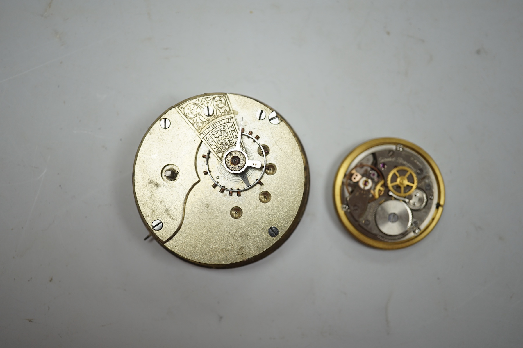 A gentleman's stainless steel Omega Seamaster manual with wrist watch, case diameter 35mm, on associated bracelet, together with three assorted pocket watches, a Girard Perregaux wrist watch movement and assorted silver